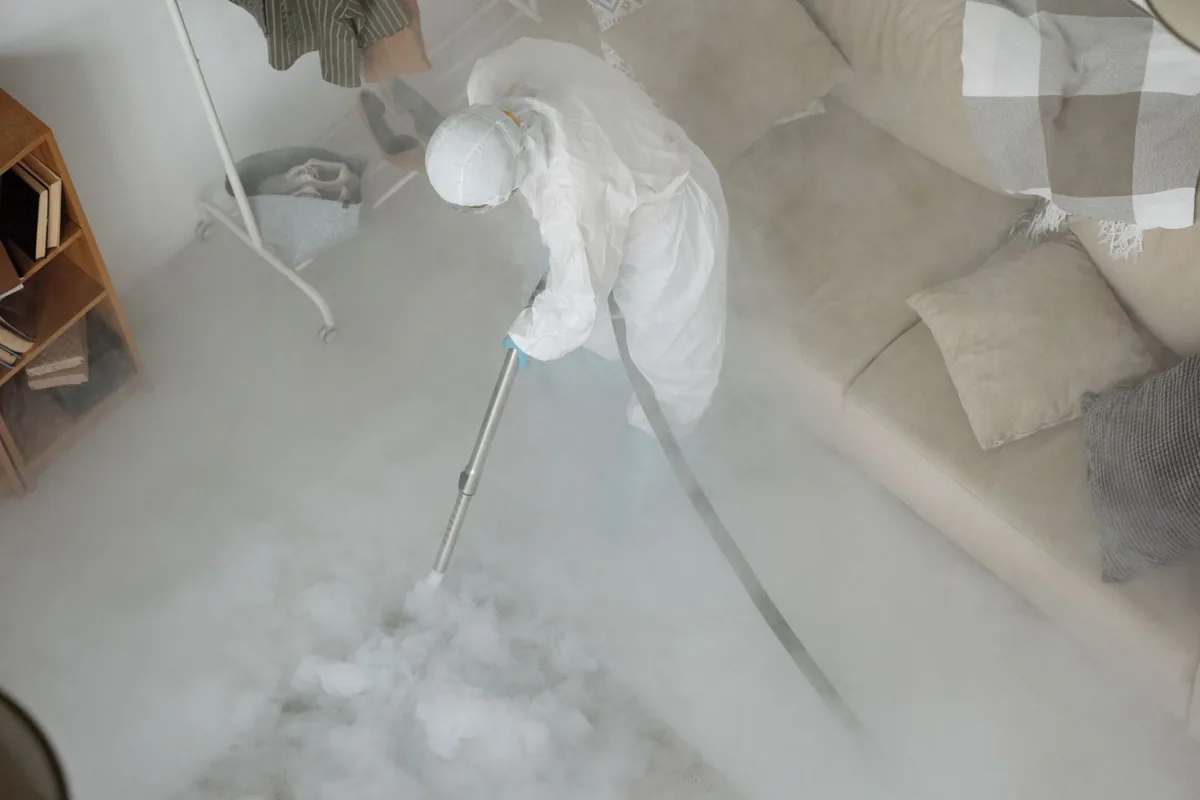 Biohazard cleanup technician in protective equipment, Niles, OH